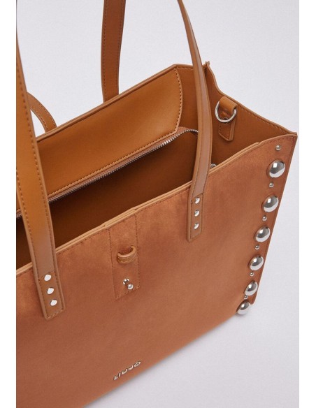 Borsa tote grande scamosciata con borchie